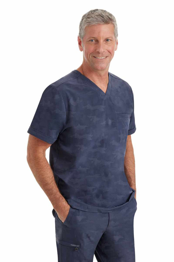 A side view of the Purple Label by Healing Hands Men's Jack Camo Scrub Top in "Pewter" size Medium.