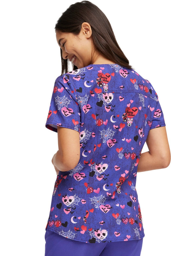 The back of the HeartSoul Women's V-Neck Halloween Printed Scrub Top in "Cheers Witches" featuring a unique polyester\spandex blended fabric.