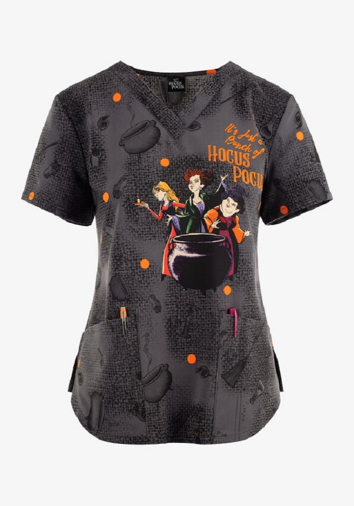 A Tooniforms Women's V-Neck Scrub Printed Scrub Top in "Hocus Pocus" featuring a wicked design featuring Sarah, Winifred, and Mary Sanderson from Disney's Hocus Pocus.
