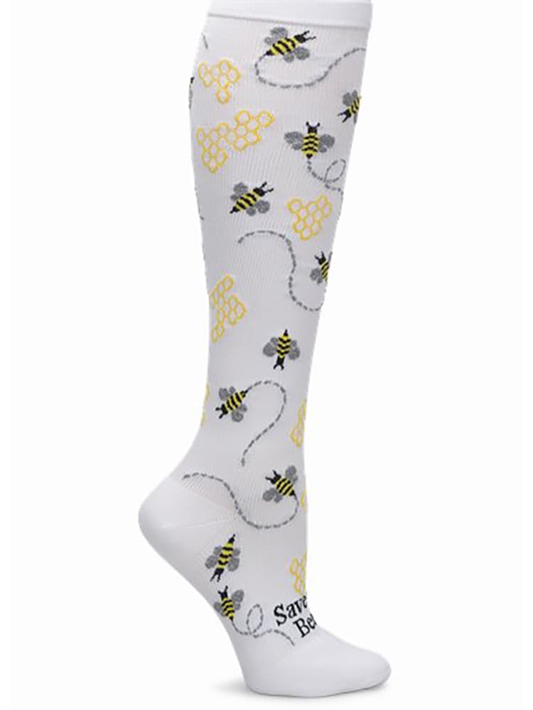 A pair of Women's Compression Socks from NurseMates in Bees featuring honey bees and honeycombs scattered across a white background.