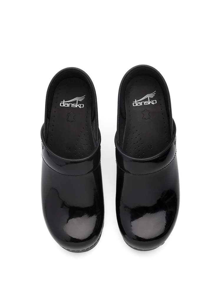 Dansko Professional Nurse Shoes in Black Patent featuring Padded instep collar.