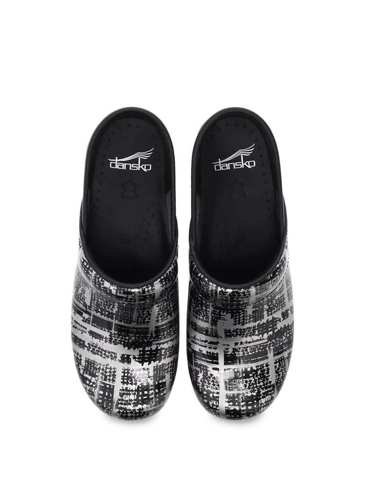Dansko Professional Nurse Shoes in Block Print Patent featuring Padded instep collar on a plain white background.