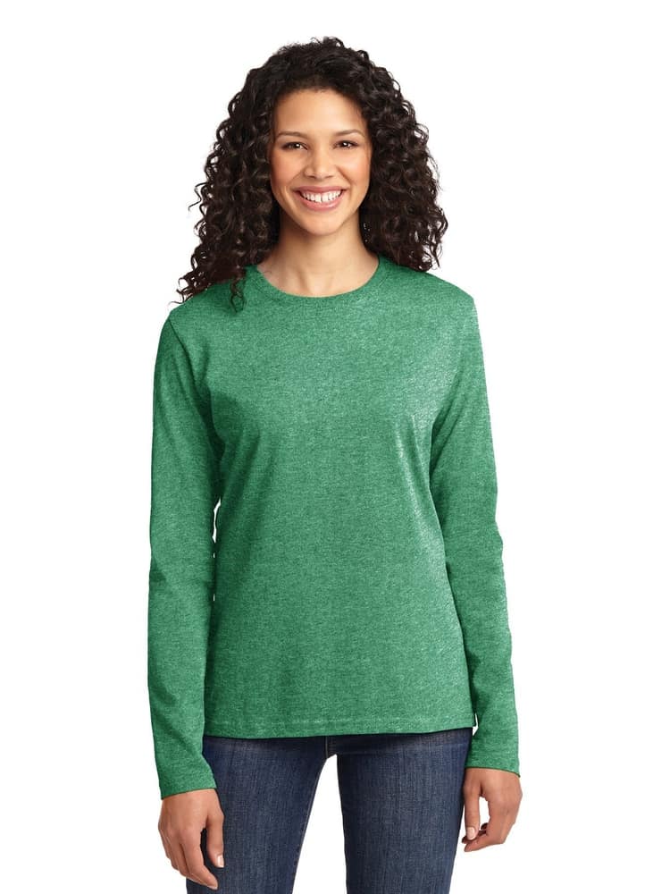 A young female Nursing Assistant wearing a Flexibilitee Women's Crew Neck Long Sleeve Tee in Green size Medium featuring a crew neckline with a rib knit collar.