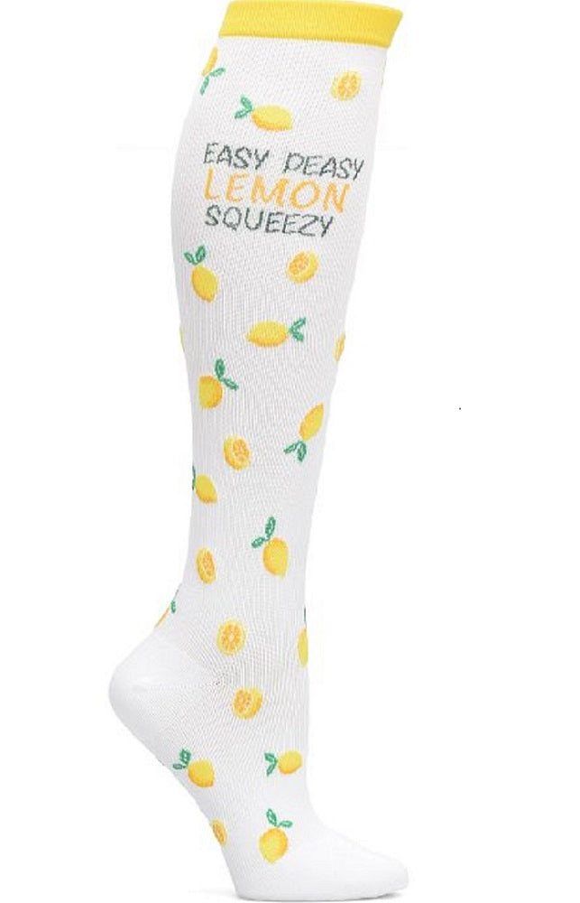 An image of the side of the of Women's Compression Socks from NurseMates in "Lemon Squeezy" featuring a cute lemon themed print with lemons scattered across a white background with the text "easy peasy, lemon squeezy" at the top of the sock.