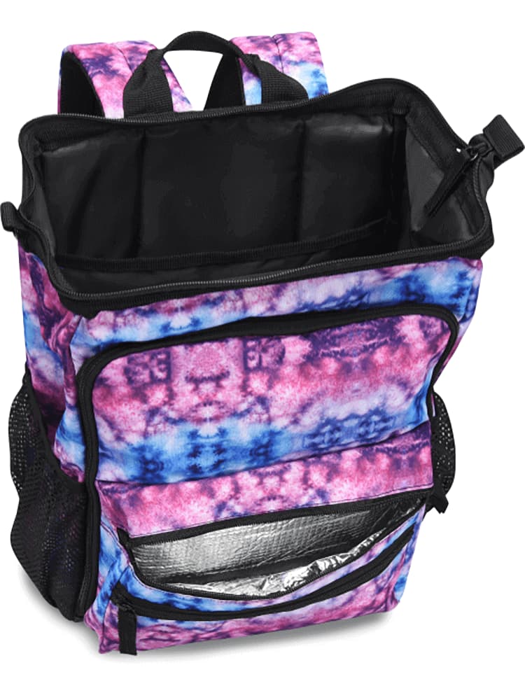 A top down image of the NurseMates Ultimate Backpack in "Berry Blue Tie Dye" featuring a large hinged mouth for easy access to the spacious interior.