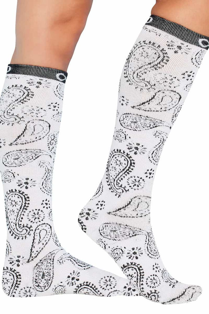 The sides of the Infinity Women's Kickstart Compression Socks in Paisley passion featuring a stylish black and paisley design.
