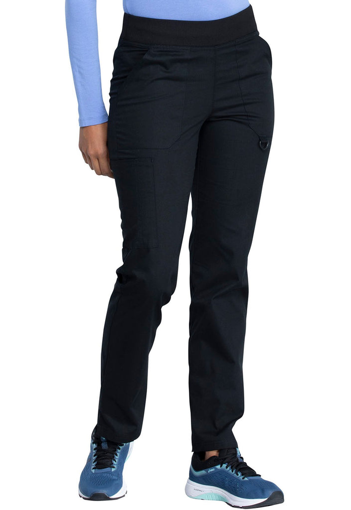 A young female Nurse wearing a Dickies EDS Signature Women's Mid Rise Tapered Leg Pull-on Pant in Black size 2XL Petite featuring an adjustable interior drawstring.