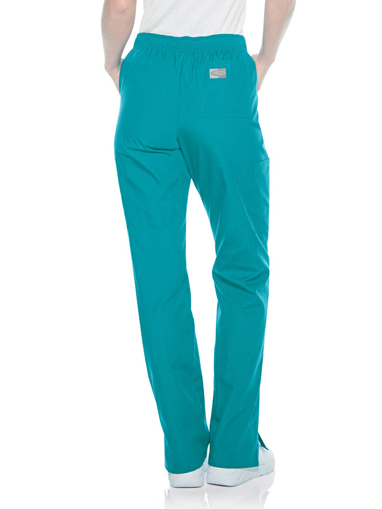 Female nurse wearing a pair of Landau Scrub Zone Women's Straight Leg Cargo Pants in teal featuring a modern tailored fit.
