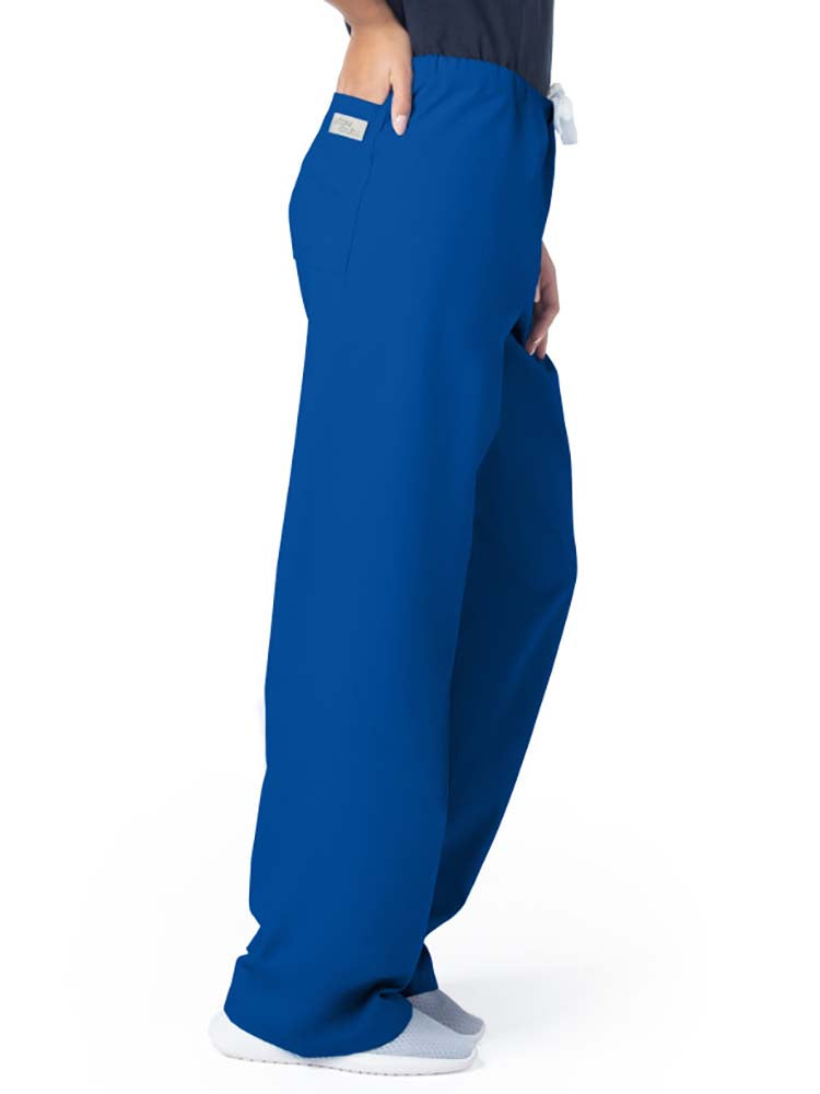 Female healthcare professional wearing a pair of Urbane Essentials Women's Straight-Leg Pants in "Galaxy Blue" featuring 1 back patch pocket.