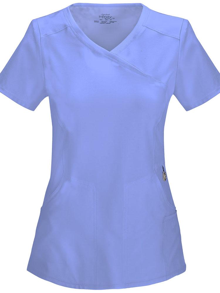 A frontward facing image of the Cherokee Infinity Women's Antimicrobial Mock Wrap Top in Ceil size Large featuring front and back princess seams for a fitted look
