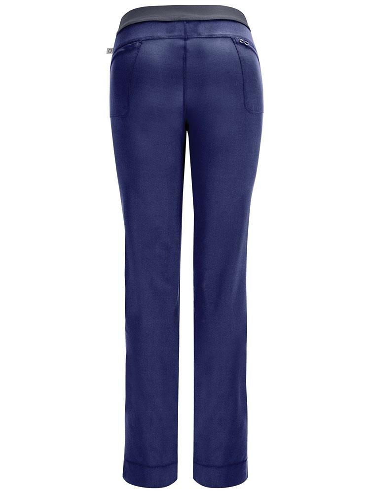 An image of the back of the Cherokee Infinity Women's Low-Rise Slim Pull On Scrub Pant in Navy size Small Petite featuring rib knit fabric for added stretch.