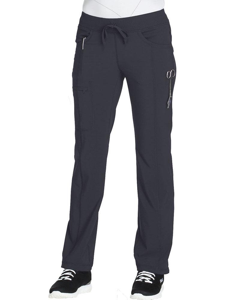 A female Pharmacy Technician wearing a Cherokee Infinity Women's Low-Rise Straight Leg Scrub Pant in pewter featuring a bungee instrument loop below left pocket.