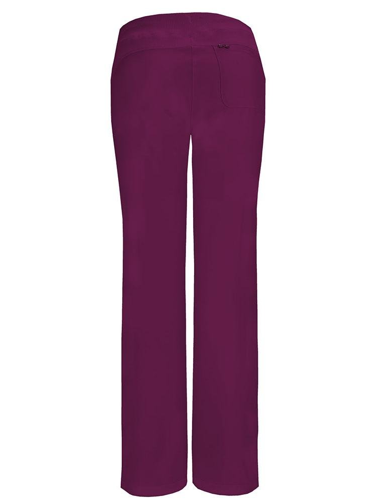 A backward facing image of the Cherokee Infinity Women's Low-Rise Straight Leg Scrub Pant in Wine size Large featuring a single back patch pocket.