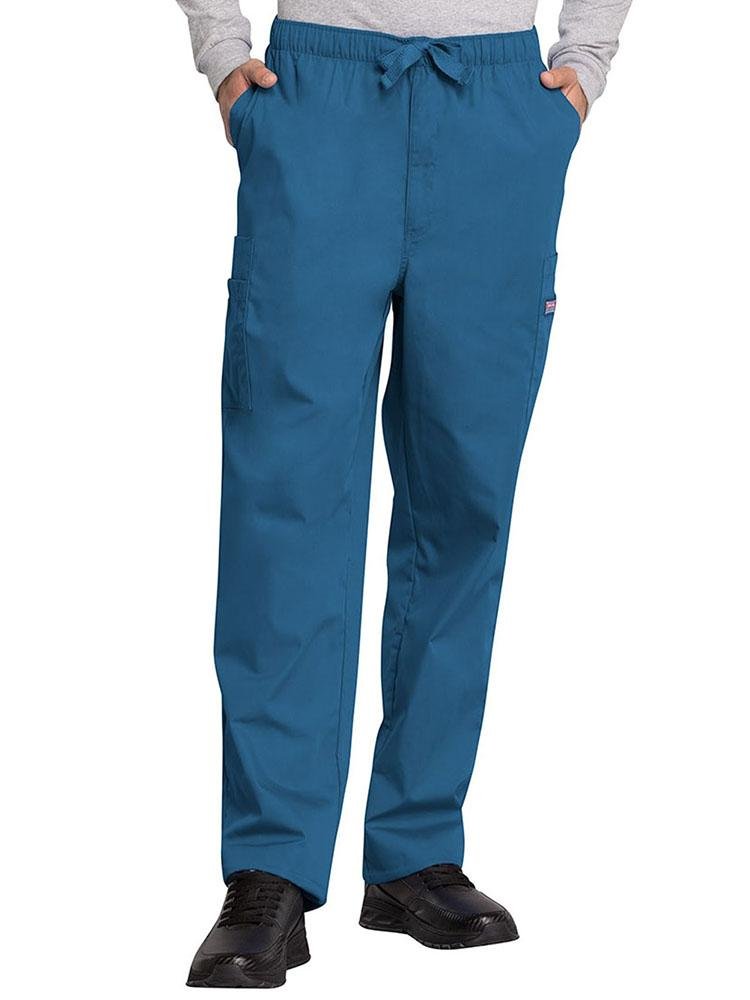 A young male CNA wearing a Cherokee Workwear Originals Men's Drawstring Cargo Scrub Pant in Caribbean size XL featuring an elastic waistband with a webbed drawstring.