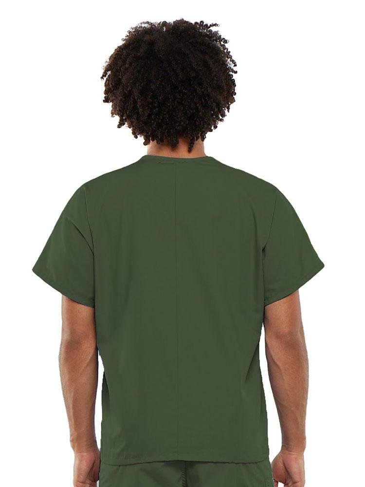 A young male Clinical Laboratory Technician wearing a Cherokee Workwear Originals Unisex Single Pocket V-neck Scrub Top in Olive size Large featuring a center back length of 27.5".