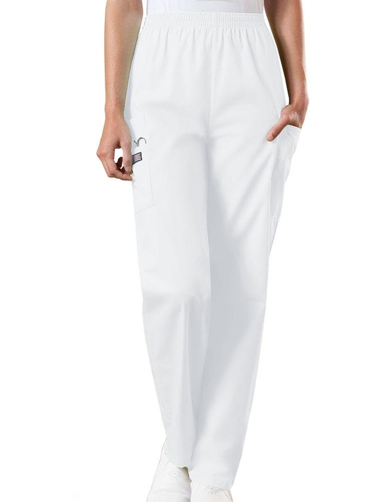 A young female Emergency Medical Technician wearing a Cherokee Workwear Originals Women's Natural Rise Tapered Pull-On Scrub Pant in White size Large Petite featuring an elastic waist.