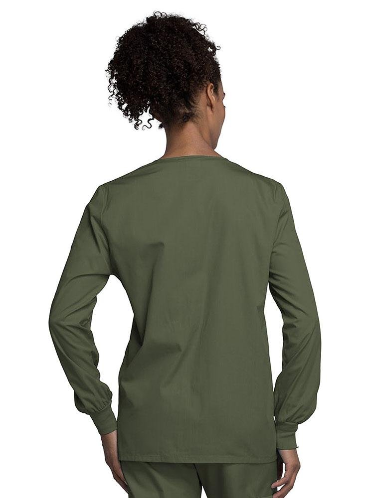 A view of the back of a Cherokee Workwear Originals Women's Snap Front Warm-Up Jacket in Olive size Medium with soil release fabric.