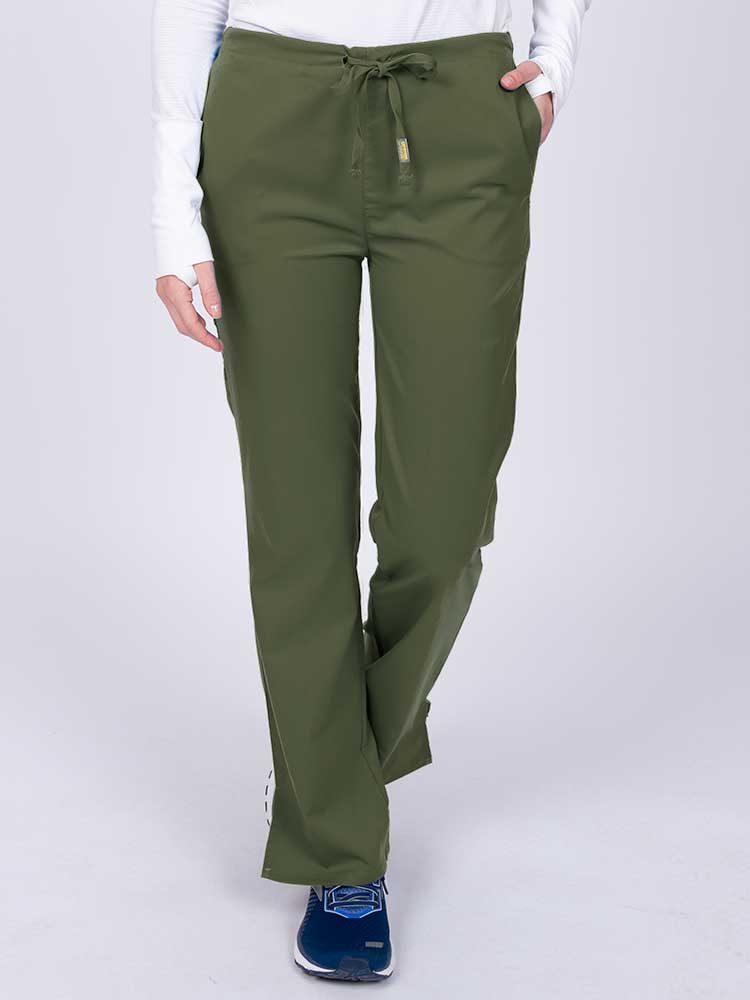 Young nurse wearing an Epic by MedWorks Women's Drawstring Flare Leg Scrub Pant in olive with unique stretch fabric made of 77% Polyester, 21% Viscose, 2% Spandex.