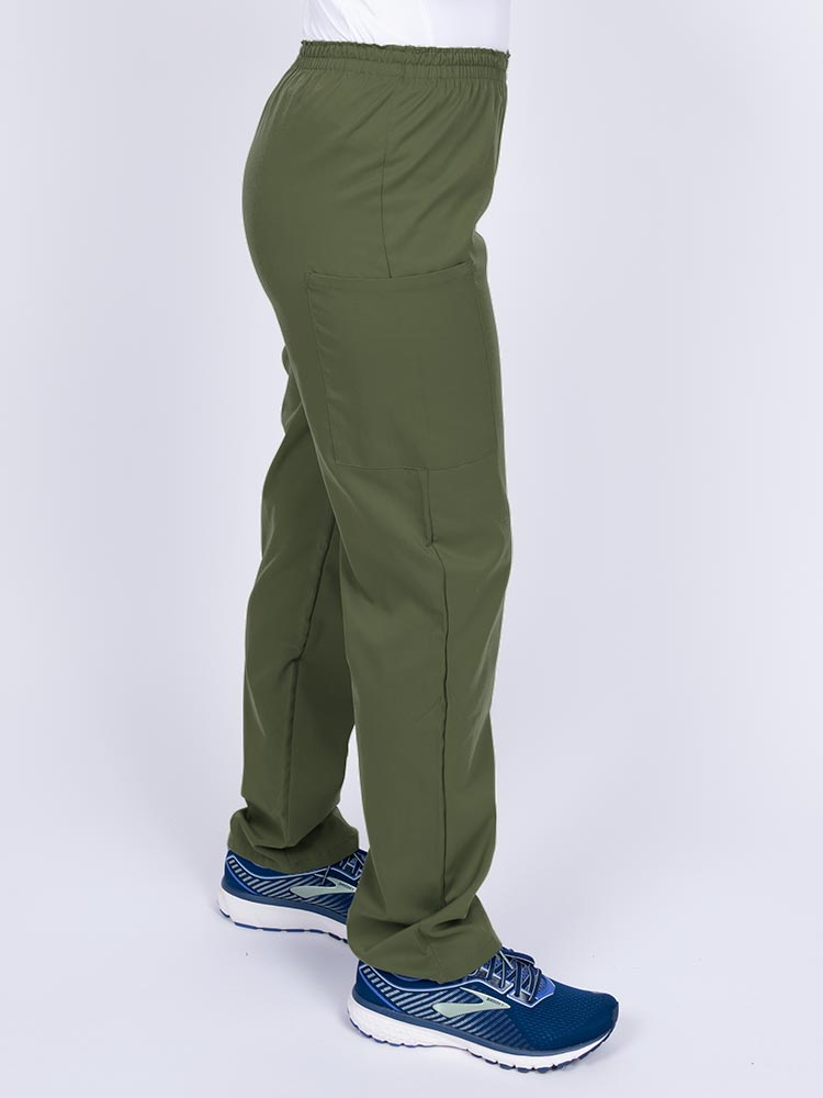 Woman wearing an Epic by MedWorks Women's Elastic Waist Scrub Pant in olive with two cargo pockets.
