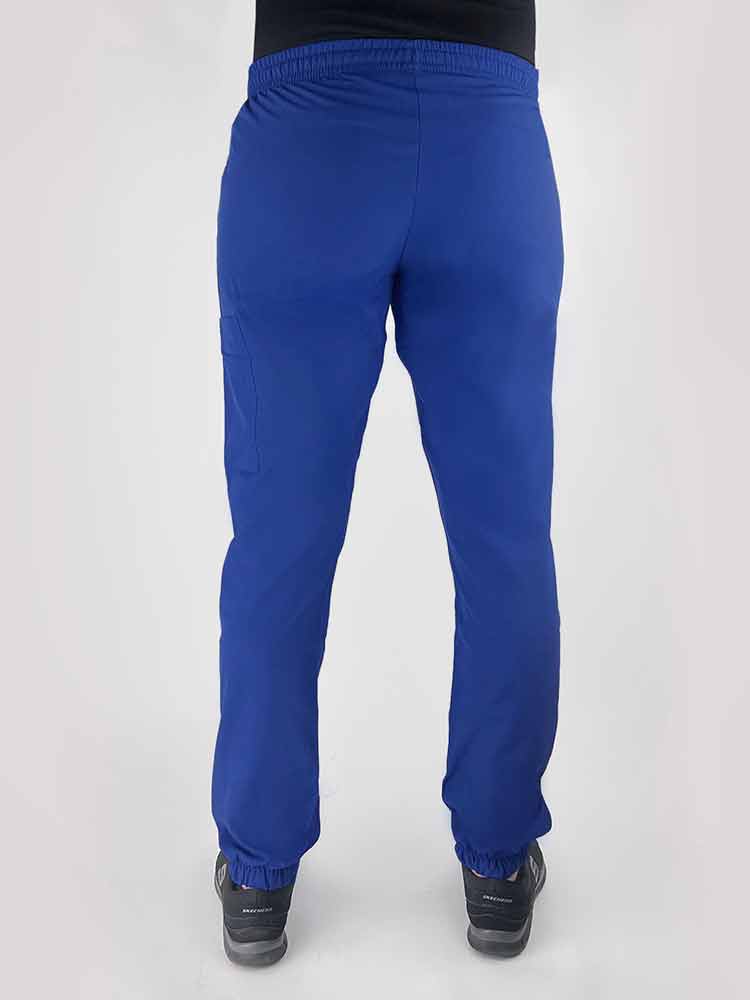 Young woman wearing a Luv Scrubs by MedWorks Women's Scrub Jogger in royal with an elastic, drawstring waist.