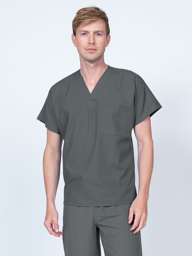 Man wearing a Luv Scrubs Unisex Single Pocket V-Neck Scrub Top in pewter with dolman sleeves and 1 chest pocket.