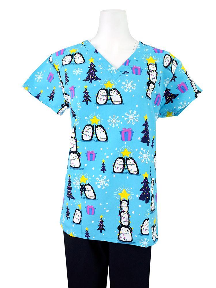 The Luv Scrubs Women's Holiday Print Scrub Top in Penguin Holiday Lights featuring a v-neckline and short sleeves.