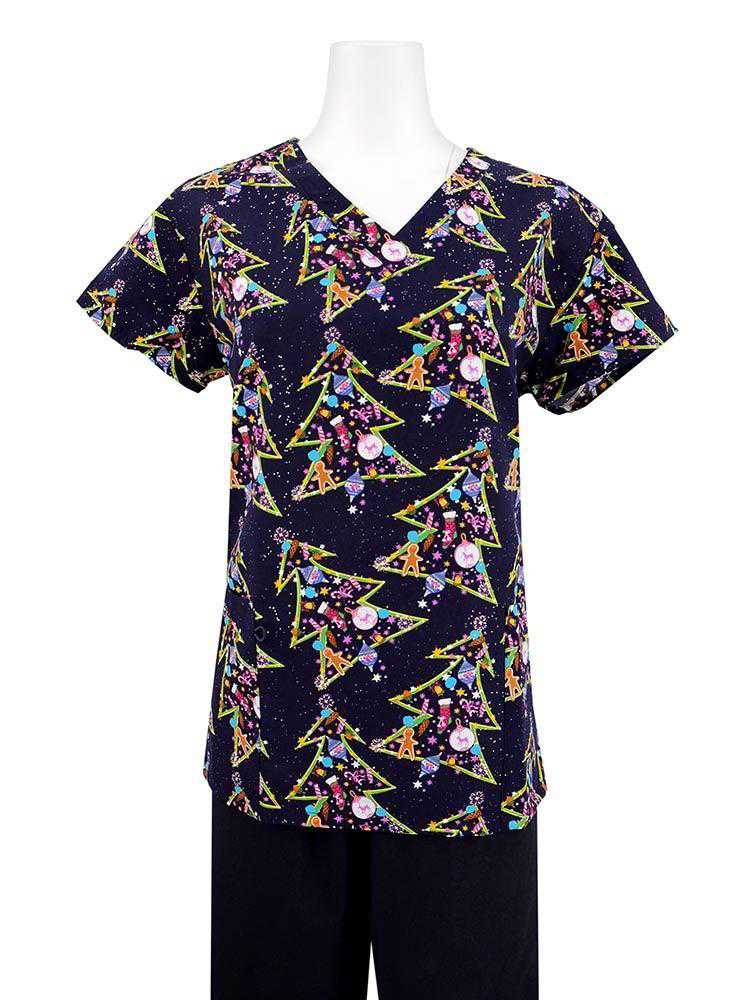 A mannequin wearing a Luv Scrubs Women's Holiday Print Scrub Top in "Starry Night Christmas" featuring 2 front patch pockets and short sleeves.