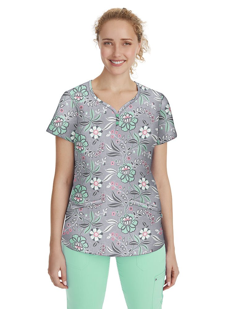 Nurse wearing a Women's Isabel Print Top from Premiere by Healing Hands in "Simply Sweet" featuring bust & back darts for a flattering fit.