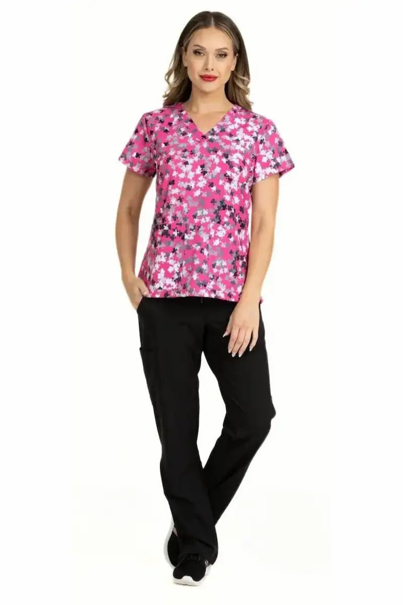 A full body look at the Meraki Sport Women's Print Scrub Top in Love Crushin from Scrub Pro Uniforms.