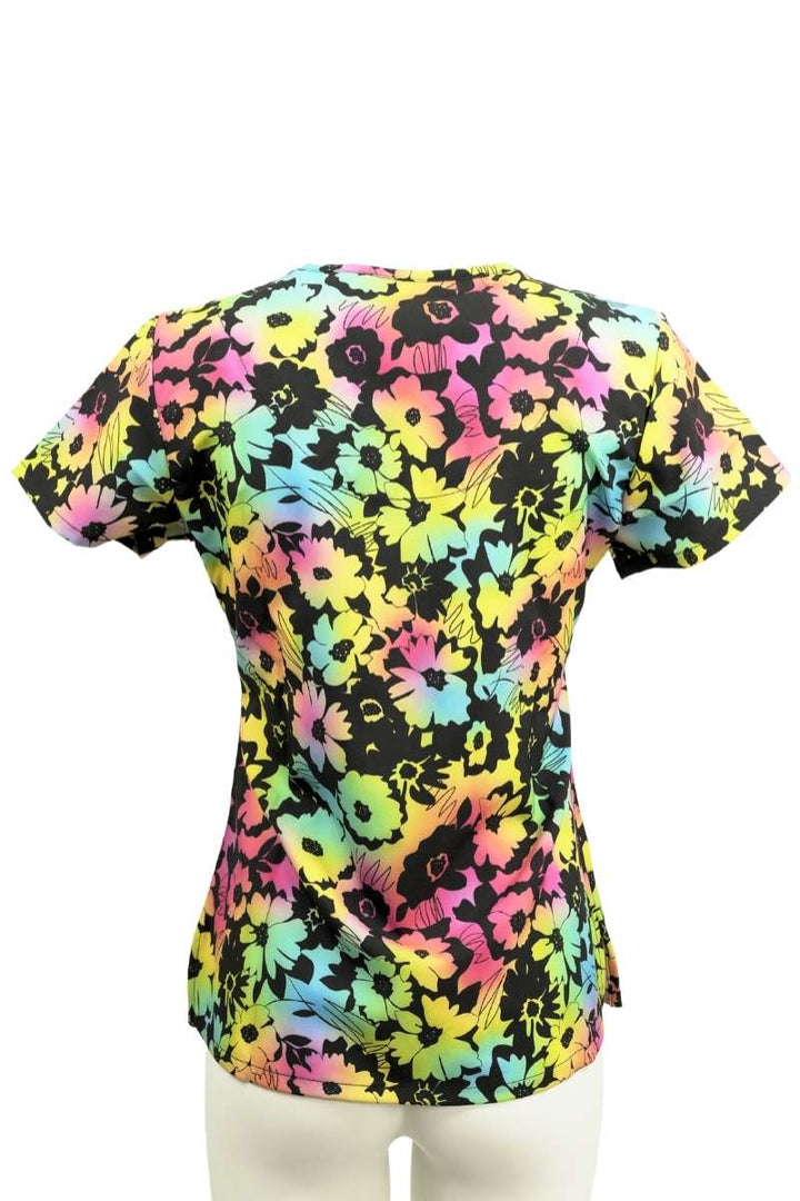 The back of the Meraki Sport Women's Print Scrub Top from MedWorks in "Floral Glow" size medium featuring a 4-way stretch movement fabric.