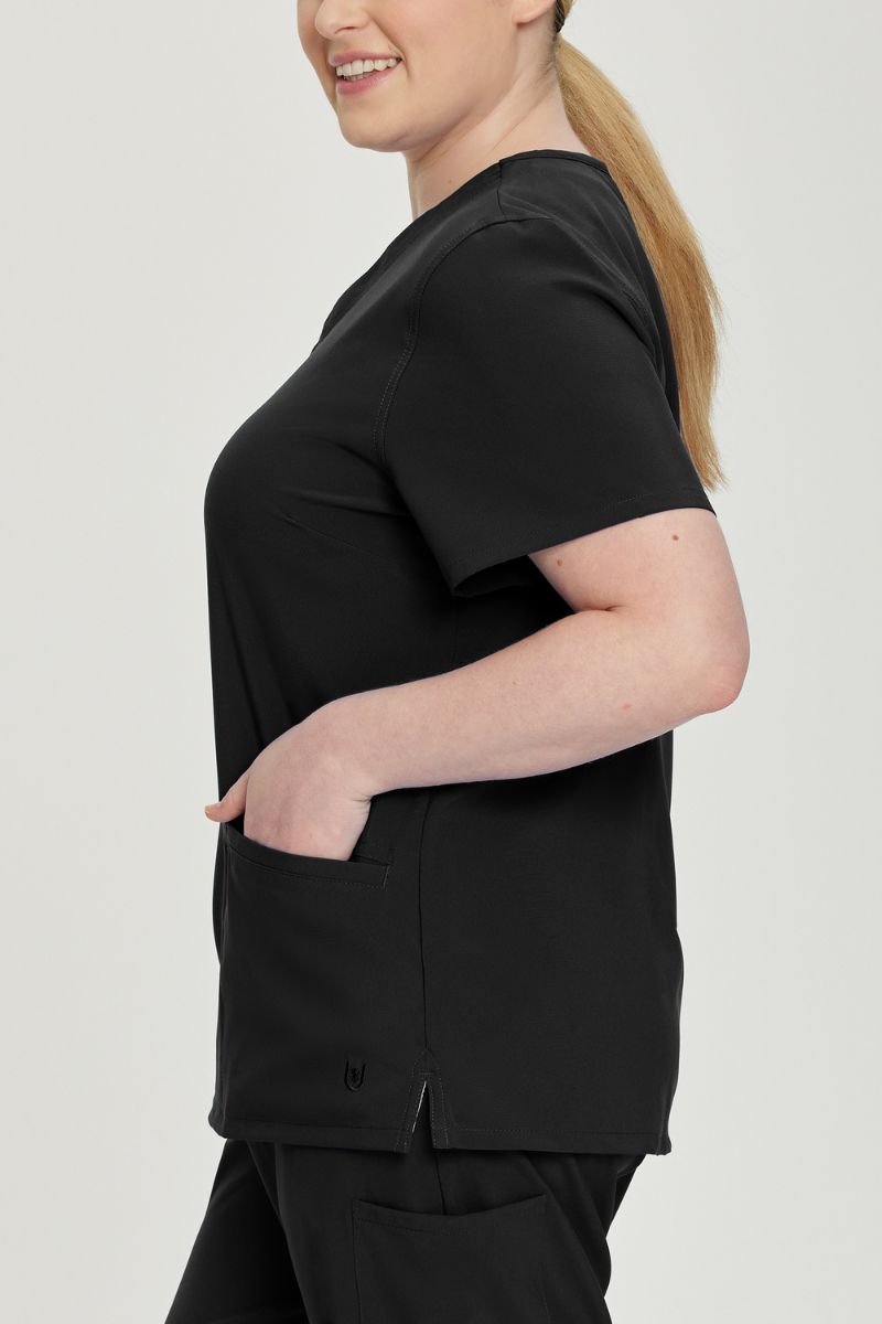 The side of the Urbane Performance Women's Motivate V-neck Scrub Top in Black size 3XL featuring two front angled welt pockets.