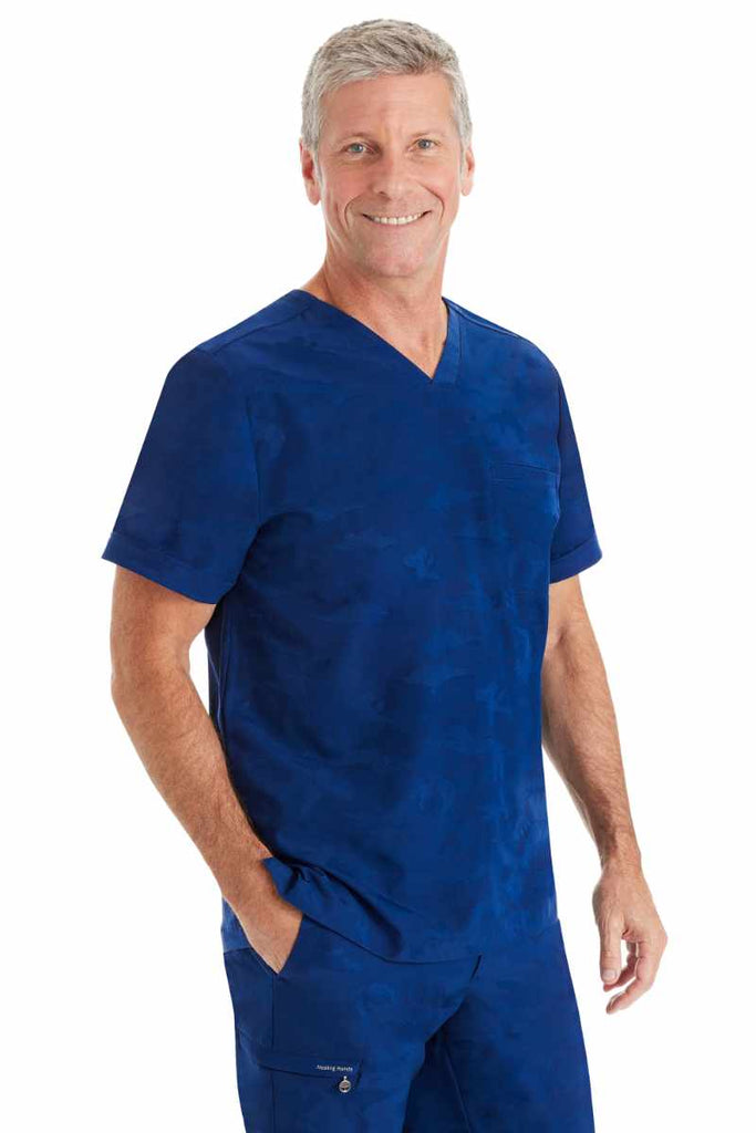 A side view of the Purple Label by Healing Hands Men's Jack Camo Scrub Top in "Navy" size Medium.