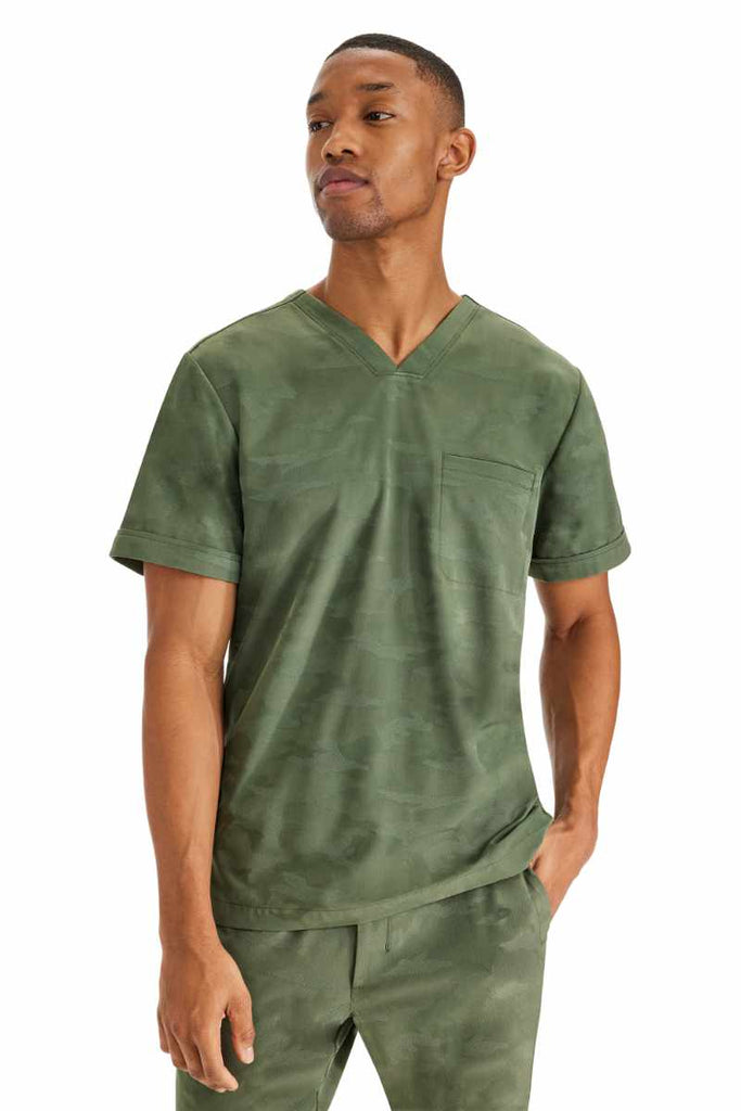 A side view of the Purple Label by Healing Hands Men's Jack Camo Scrub Top in "Olive" size Medium.
