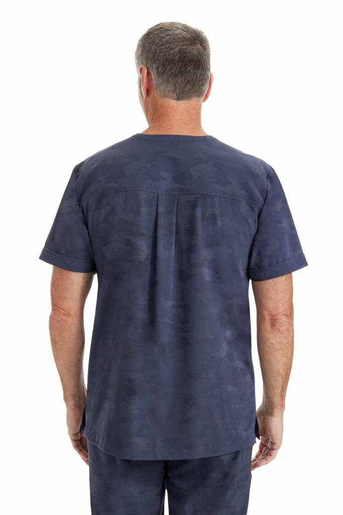 An image of a male Phlebotomist wearing a Purple Label by Healing Hands Men's Jack Camo Scrub Top in "Pewter" size Large featuring a center back yoke with box pleat detail.