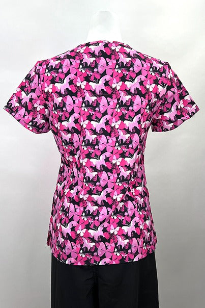 An image of the Revel Women's V-neck Print Scrub Top in "Beautiful Butterflies" size Small featuring side slits for additional range of motion throughout the day.