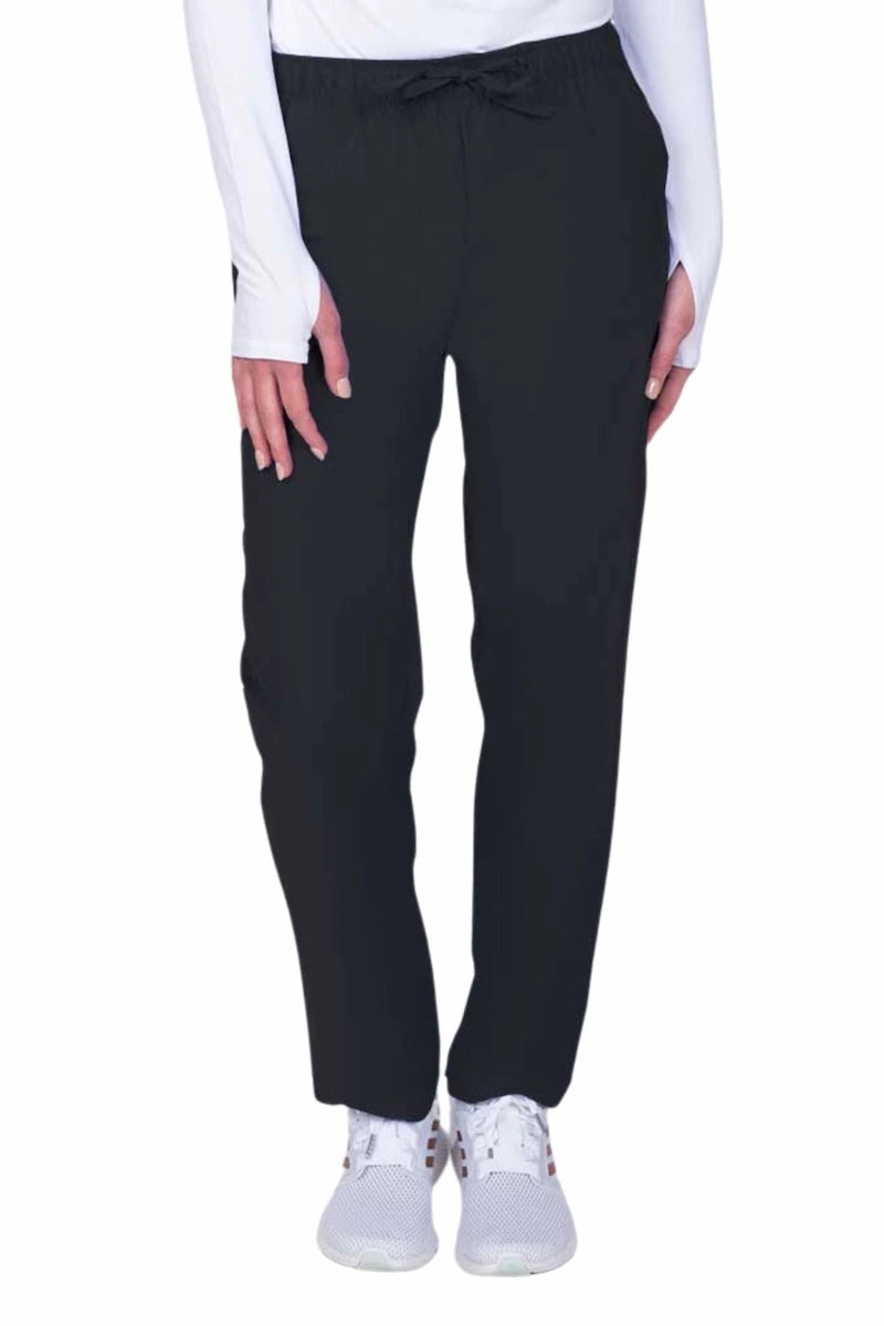 Young woman wearing a Luv Scrubs by MedWorks Women's Elastic Waist Cargo Pant in black featuring one cargo pocket on the wearer's left side.