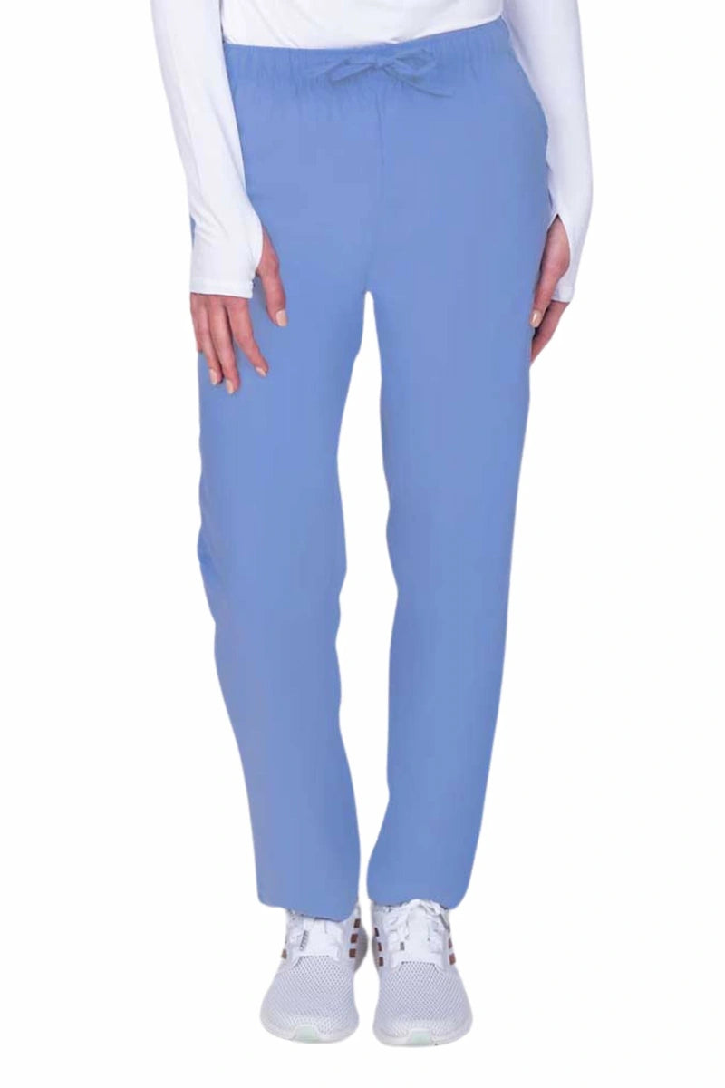 Young woman wearing a Luv Scrubs by MedWorks Women's Elastic Waist Cargo Pant in ceil featuring one cargo pocket on the wearer's left side.