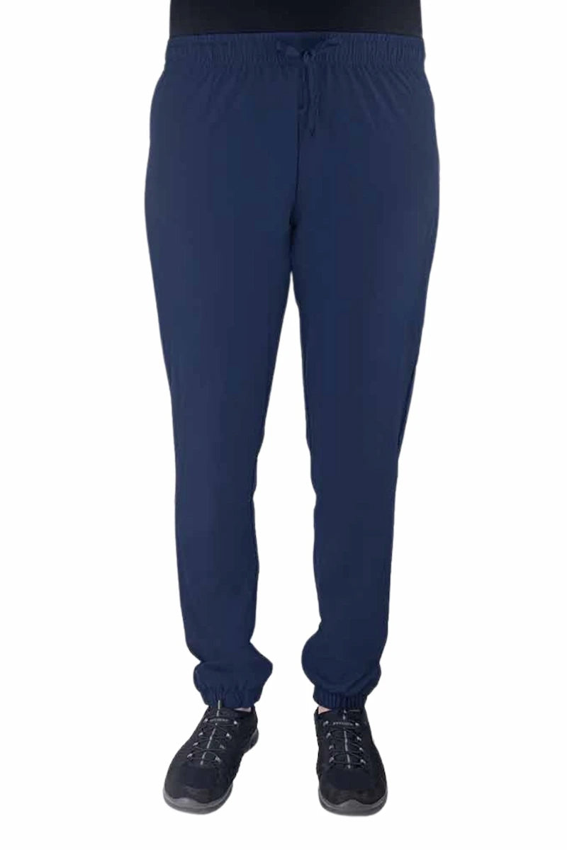 Nurse wearing a Luv Scrubs by MedWorks Women's Pocketless Jogger in navy with an elastic, drawstring waist.