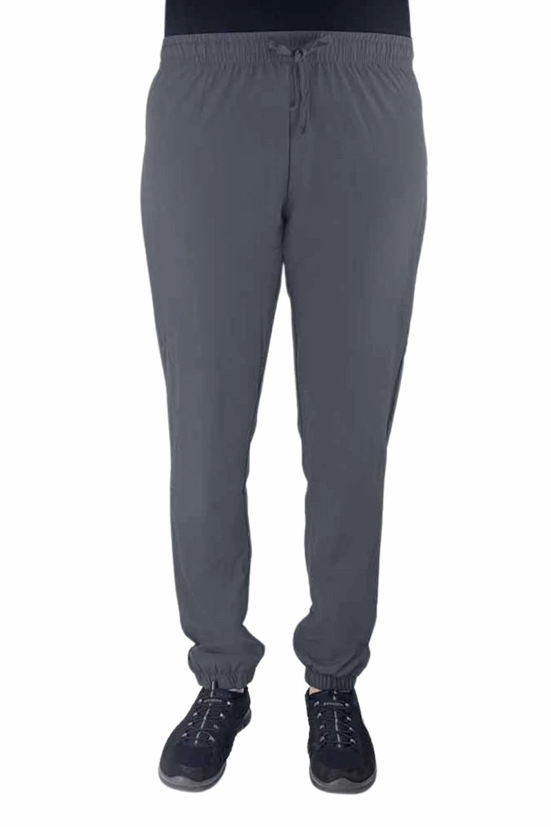 Nurse wearing a Luv Scrubs by MedWorks Women's Pocketless Jogger in pewter with an elastic, drawstring waist.