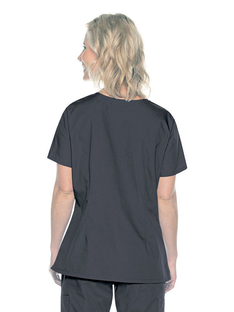 A female Home Health Aide wearing a Landau ScrubZone Women's Mock Wrap Scrub Top in Graphite size XL featuring a center back length of 27.5".