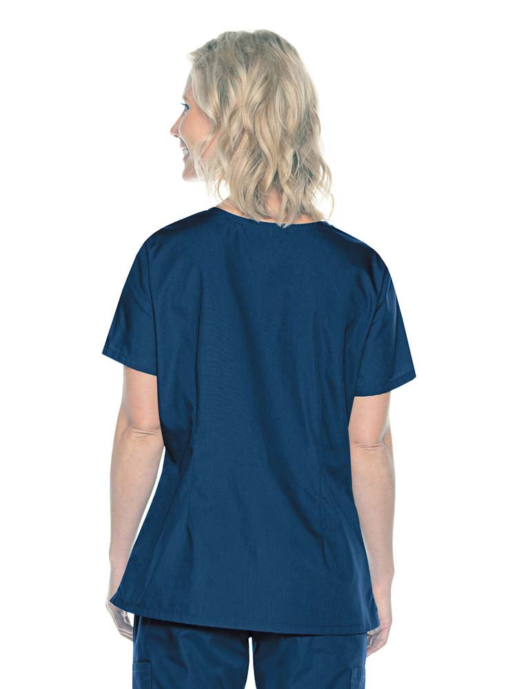 A female Home Health Aide wearing a Landau ScrubZone Women's Mock Wrap Scrub Top in Navy size XL featuring a center back length of 27.5".
