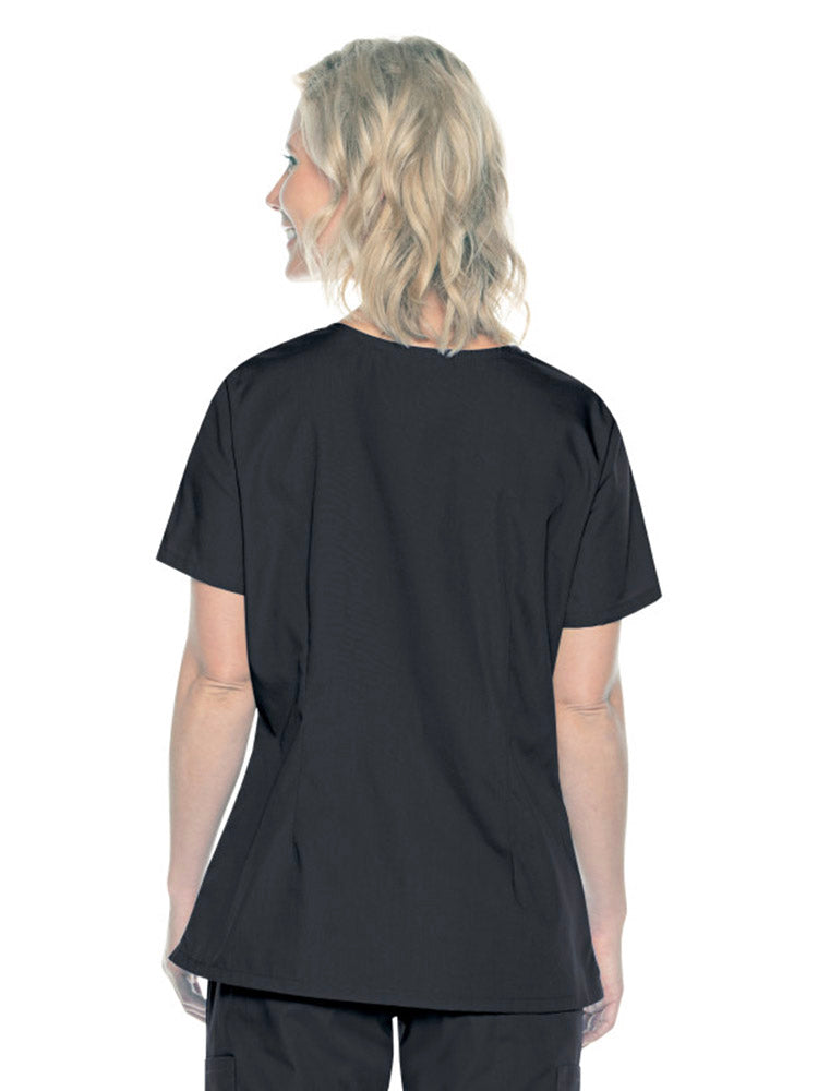A female Home Health Aide wearing a Landau ScrubZone Women's Mock Wrap Scrub Top in Black size XL featuring a center back length of 27.5".
