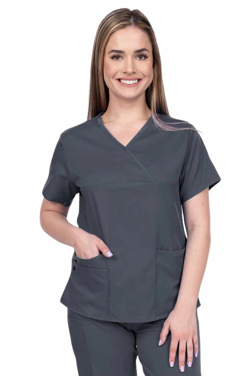 Woman wearing an Epic by MedWorks Women's Y-Neck Scrub Top in pewter with a super soft, 2-way stretch fabric designed to move with your body all day long.