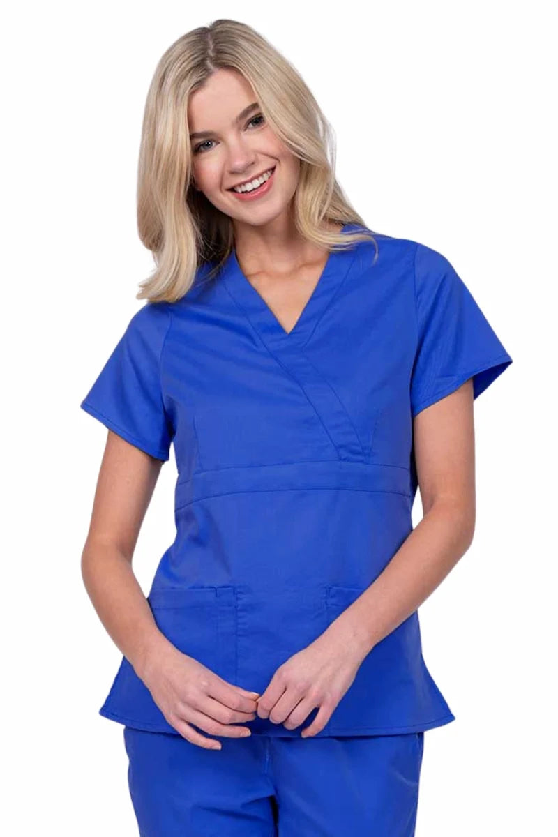 Young woman wearing an Epic by MedWorks Women's Mock Wrap Scrub Top in royal with a unique fabric content of 77% Polyester, 21% Viscose, 2% Spandex.