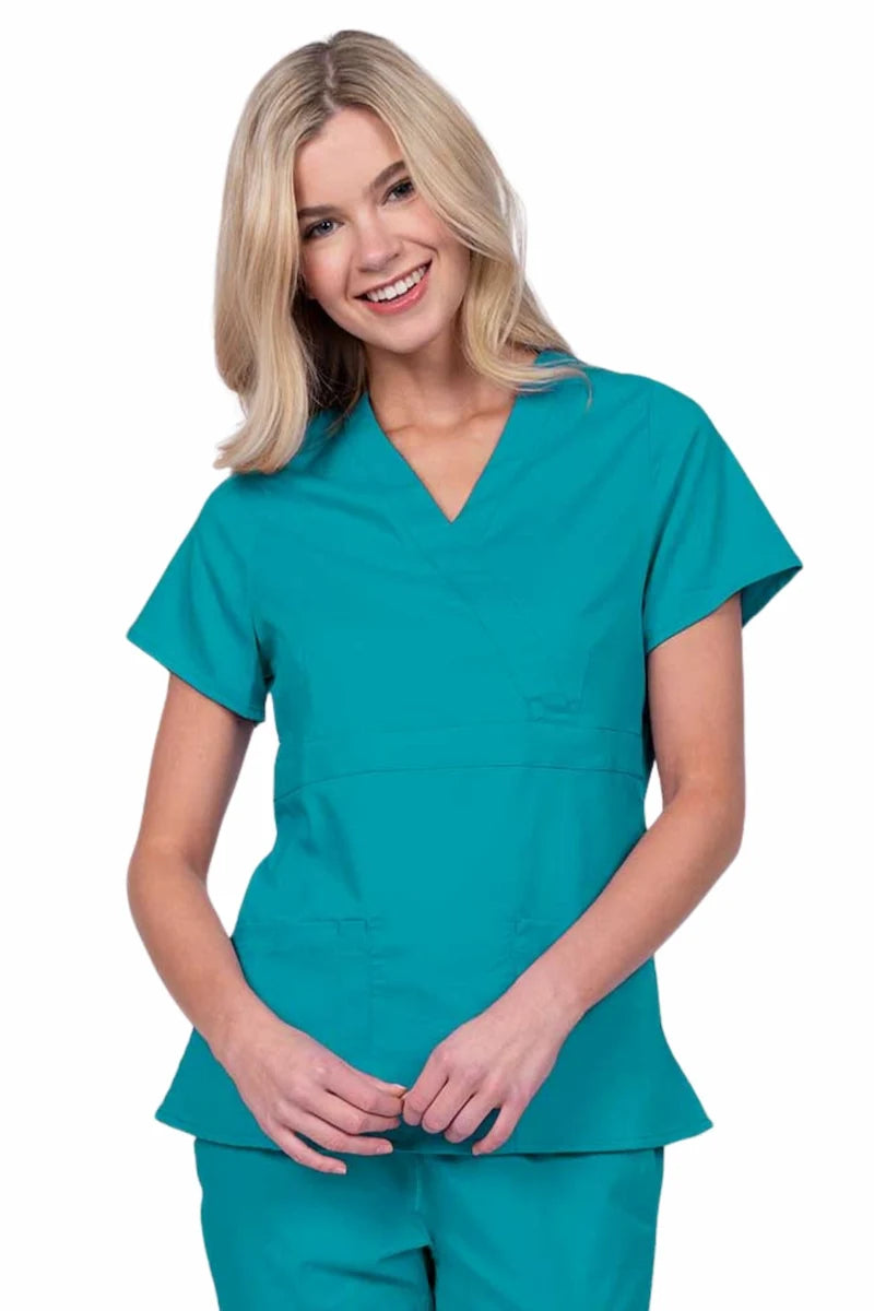 Young woman wearing an Epic by MedWorks Women's Mock Wrap Scrub Top in teal with a unique fabric content of 77% Polyester, 21% Viscose, 2% Spandex.