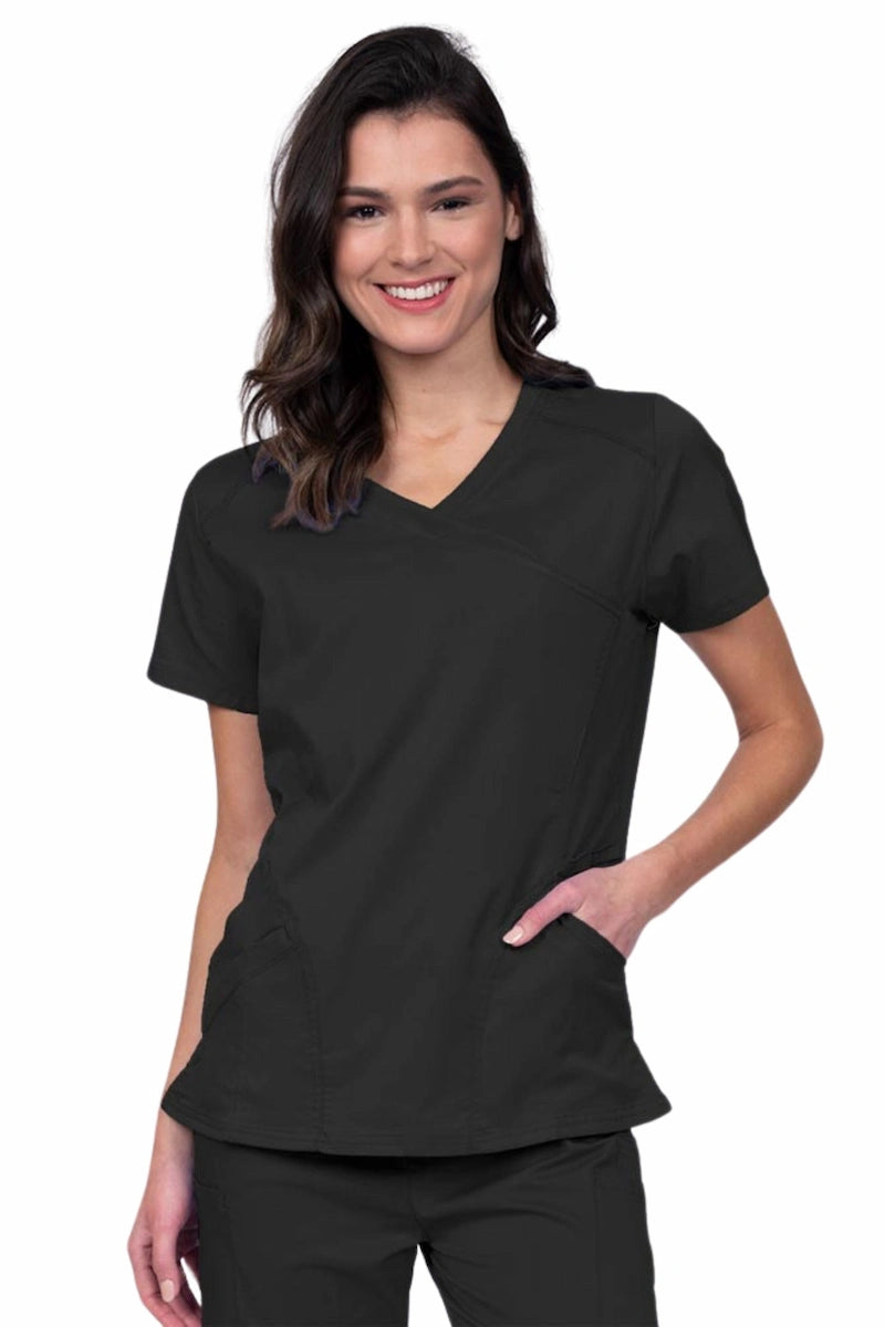 Young RN wearing an Epic by MedWorks Women's Knit Collar Mock Wrap Scrub Top in black featuring a Y-neckline with short sleeves.