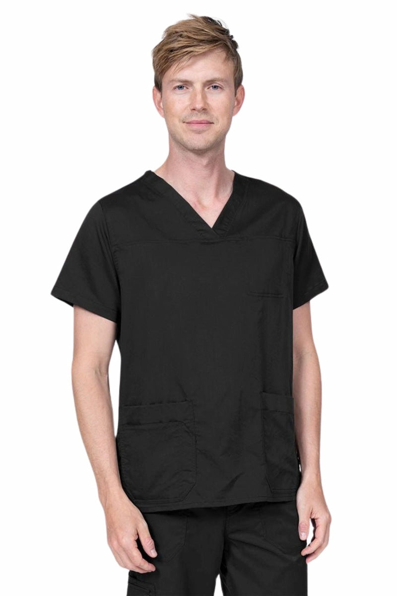 Male healthcare professional wearing an Epic by MedWorks Men's Scrub Top in black with 2 front patch pockets and 1 exterior cell phone pocket on the wearer's right side.