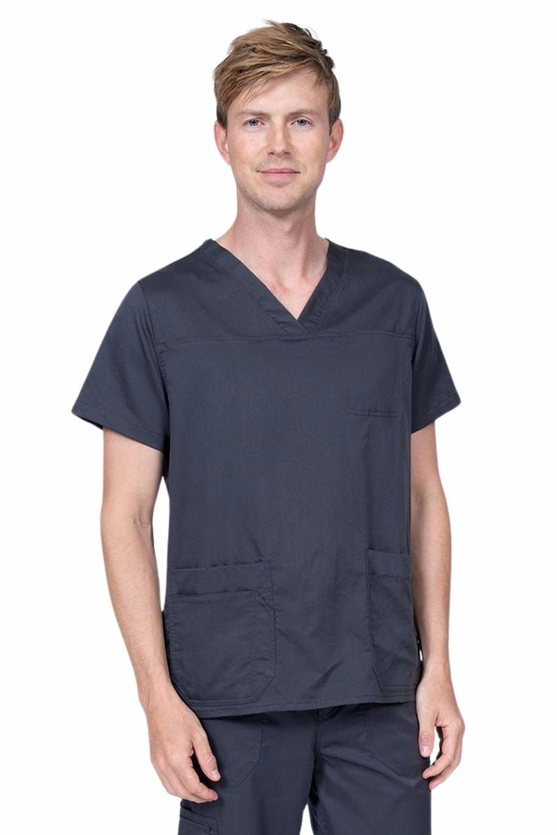 Male healthcare professional wearing an Epic by MedWorks Men's Scrub Top in pewter with 2 front patch pockets and 1 exterior cell phone pocket on the wearer's right side.