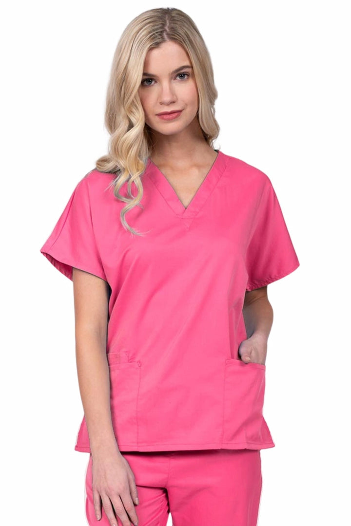 Young nurse wearing an Epic by MedWorks Unisex V-Neck Scrub Top in shocking pink with a unique, easy care fabric made of 77% polyester, 21% Viscose and 2% Spandex.