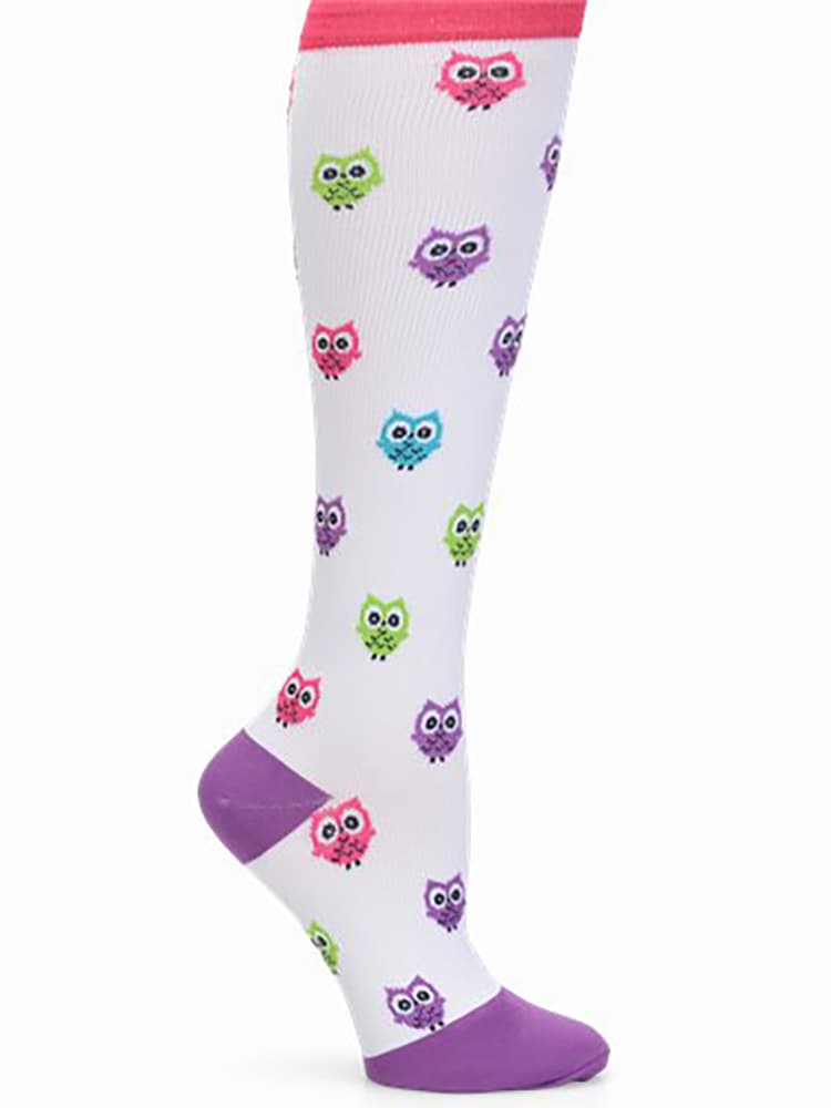 A pair of Women's Compression Socks from NurseMates in Owls featuring 12-14 mmHg Graduated Compression to help improve circulation and relieve leg fatigue.